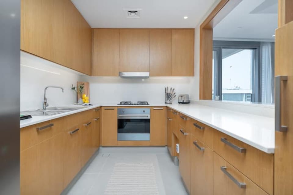Luxury Apartment | Private kitchen | Fridge, microwave, oven, stovetop