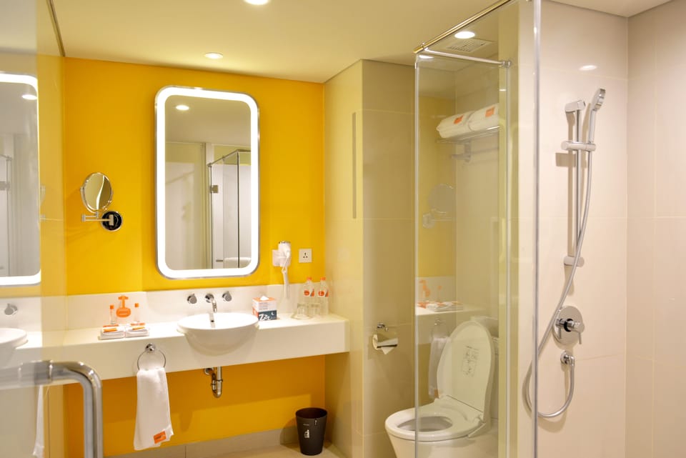 Shower, free toiletries, hair dryer, slippers
