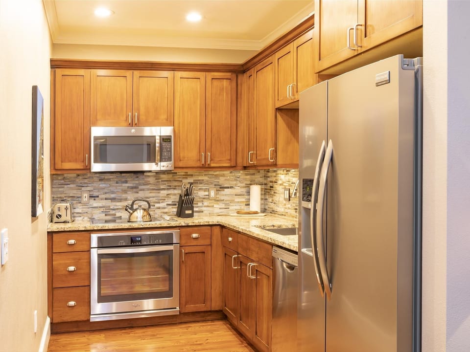 Condo, 2 Bedrooms | Private kitchen | Fridge, oven, coffee/tea maker, toaster