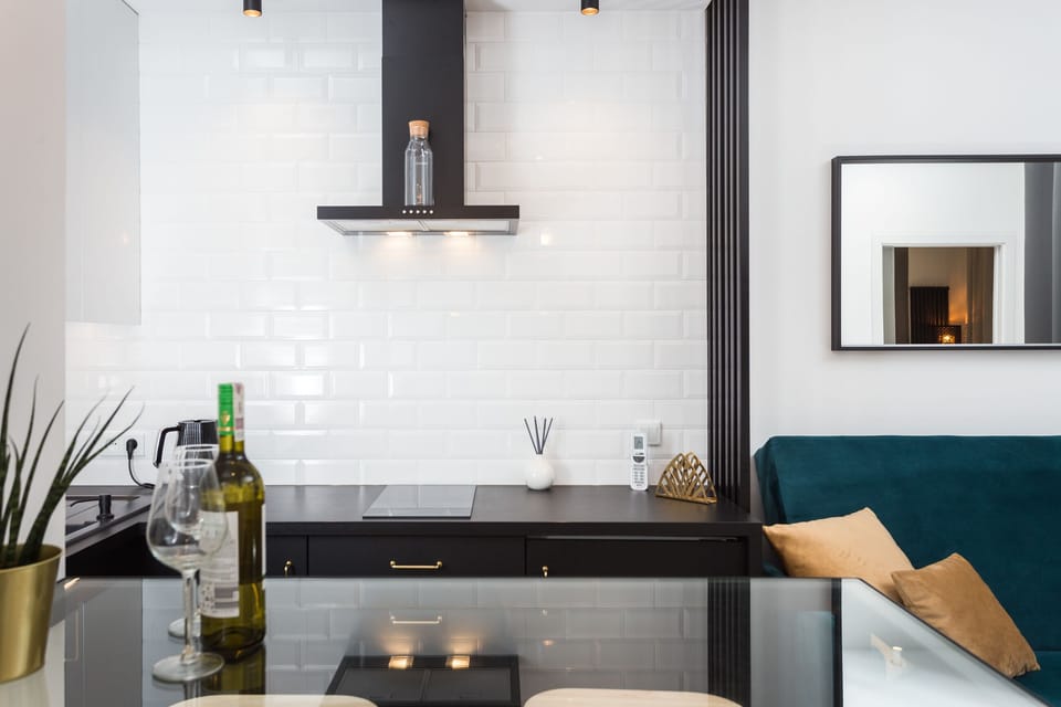 Family Apartment | Living area | 50-inch LCD TV with cable channels