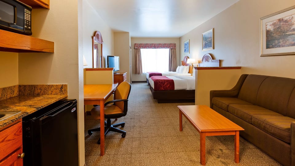 Suite, 2 Queen Beds, Non Smoking | Desk, laptop workspace, iron/ironing board, cribs/infant beds