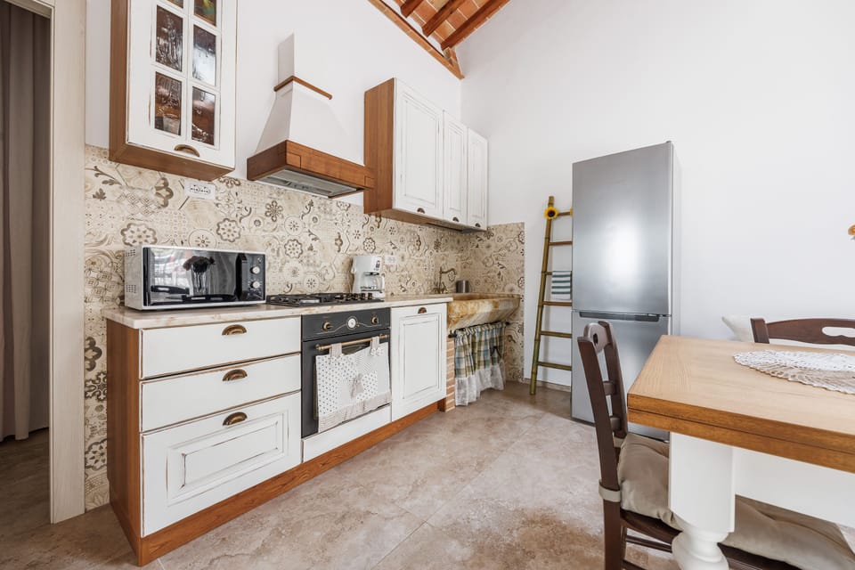 Villa | Private kitchen | Full-size fridge, microwave, oven, stovetop
