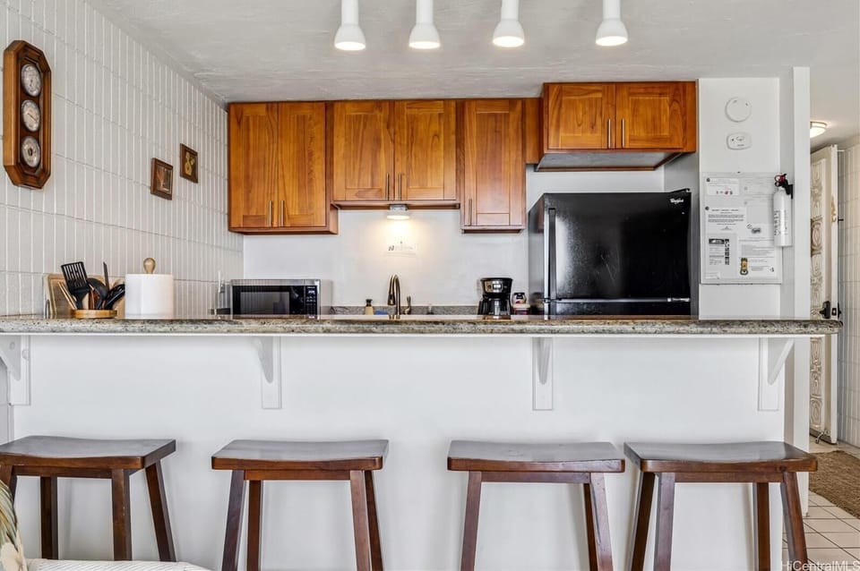 Luxury Condo | Private kitchen | Coffee/tea maker, full-size fridge, microwave, oven