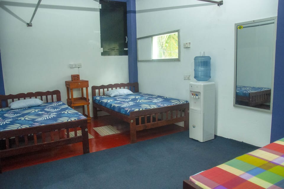 Shared Dormitory, 1 Double Bed | In-room safe, iron/ironing board (on request), WiFi (free), bed sheets