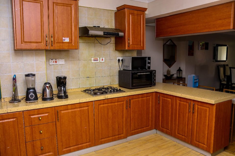 Fridge, microwave, cookware/dishes/utensils