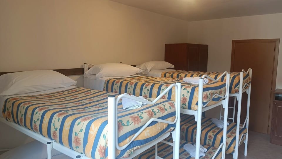 Standard Shared Dormitory, Men only | Minibar, in-room safe, individually furnished, bed sheets