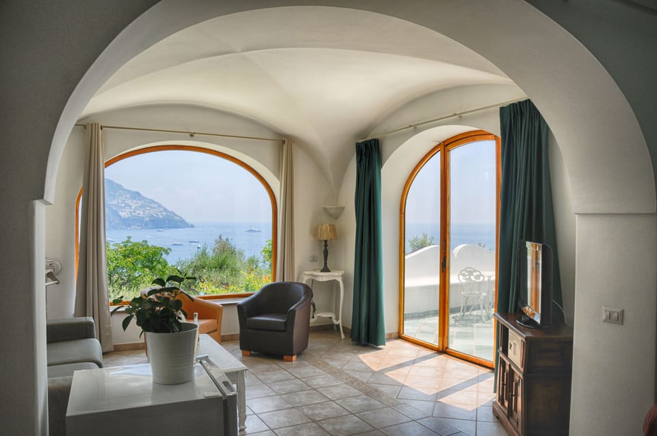 Deluxe Double or Twin Room, Sea View | Living area | Flat-screen TV