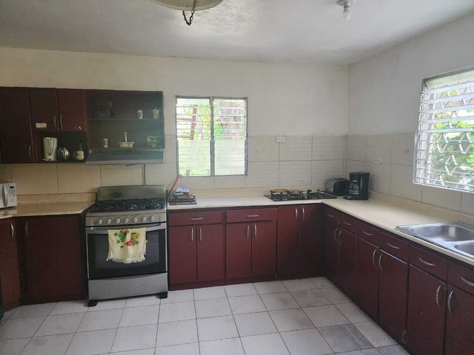 Classic Double Room, 1 Bedroom, Non Smoking | Shared kitchen | Full-size fridge, microwave, oven, stovetop