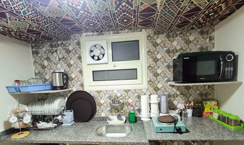 Fridge, microwave, stovetop, electric kettle