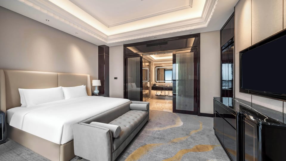 Premium bedding, down comforters, pillowtop beds, in-room safe