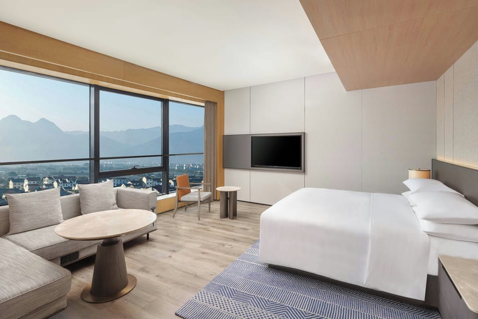 Club Room, 1 King Bed, Mountain View | Premium bedding, down comforters, free minibar items, desk