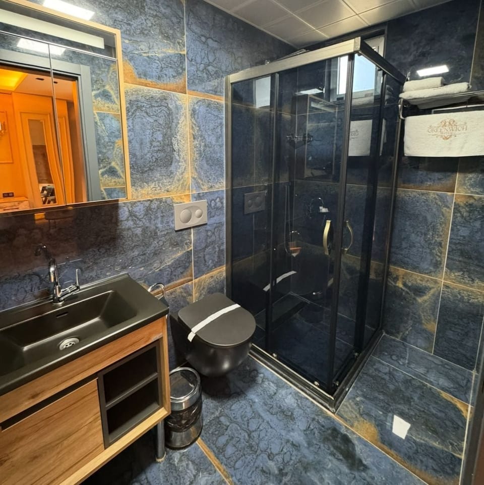 Designer toiletries, hair dryer, slippers, heated floors