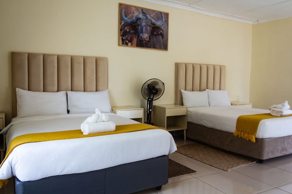 Family Twin Room | Minibar, free WiFi, bed sheets