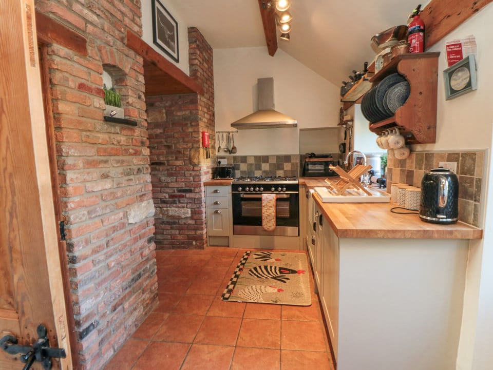 Fridge, electric kettle, toaster, cookware/dishes/utensils