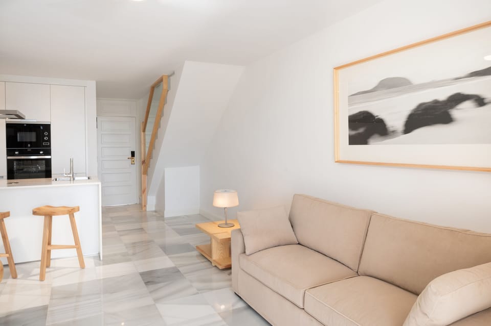 Superior Apartment, 1 Bedroom | Living area | 32-inch flat-screen TV with cable channels
