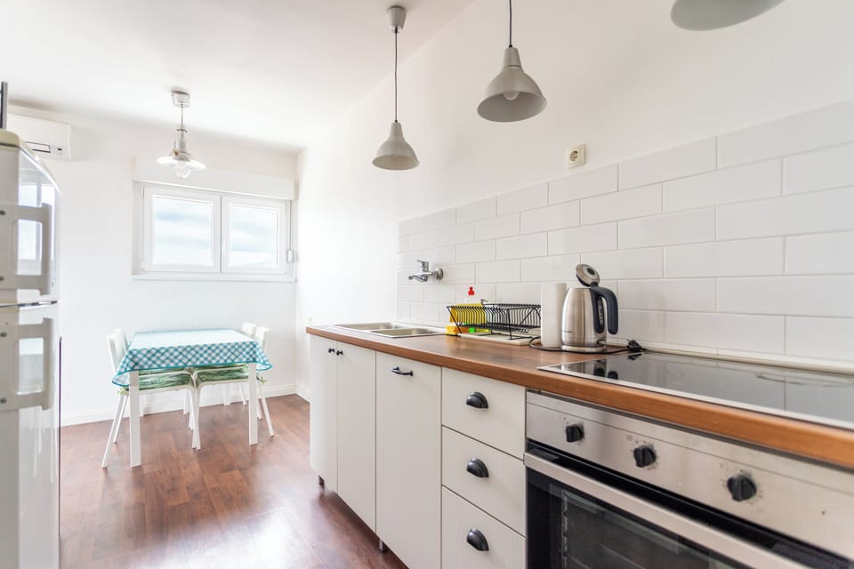 Apartment | Private kitchen | Full-size fridge, microwave, oven, stovetop