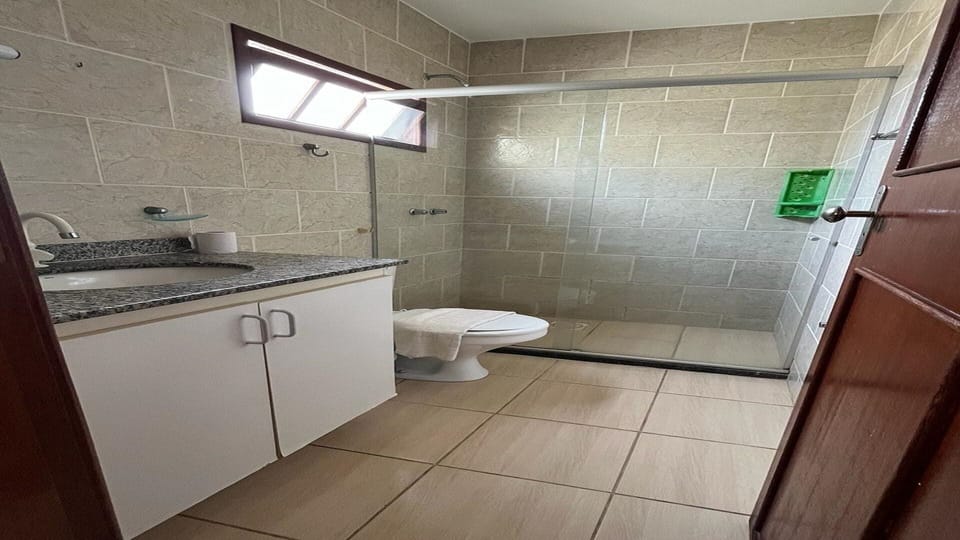 Shower, towels, soap, toilet paper