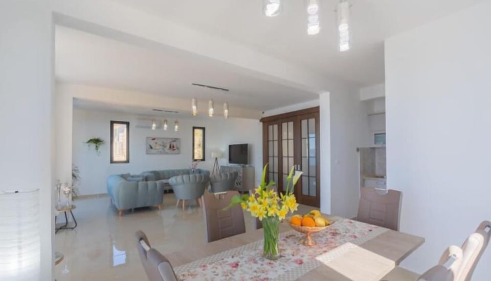 Panoramic Villa | Living area | 32-inch LCD TV with cable channels
