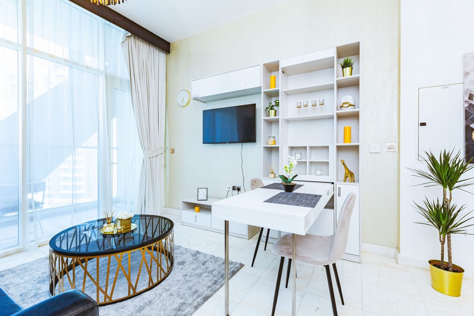 Deluxe Studio | Living area | 42-inch Smart TV with cable channels, Netflix, streaming services