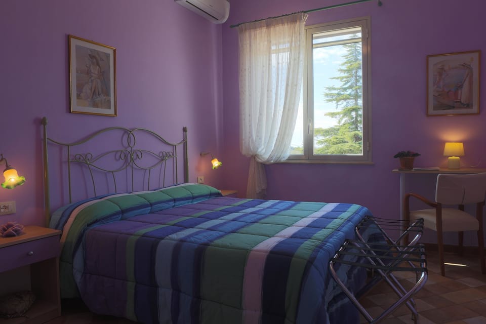 Desk, iron/ironing board, free cribs/infant beds, rollaway beds