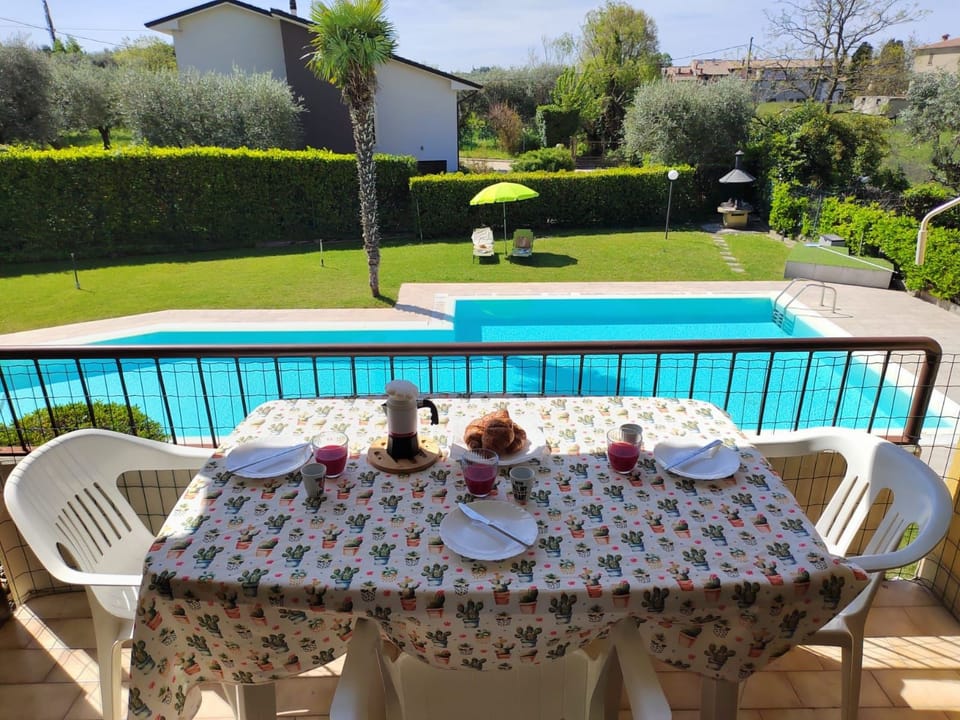 La Palma - Apartment mit Balkon und Poolblick Apartment in Lazise