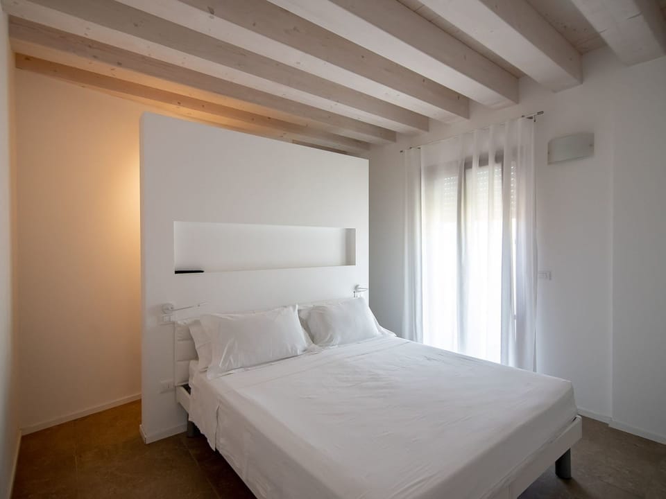 Einzimmerwohnung mit Balkon und Frühstück Apartment in Rosolina Mare