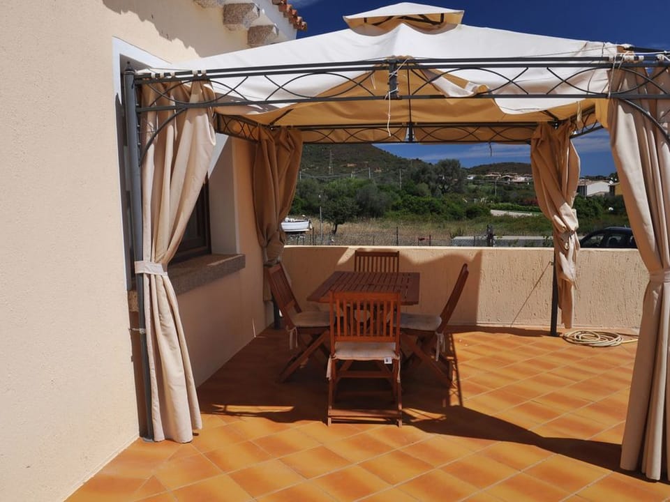 Villetta Sanna 2C, mit Meerblick Vacation rental in Sardinia