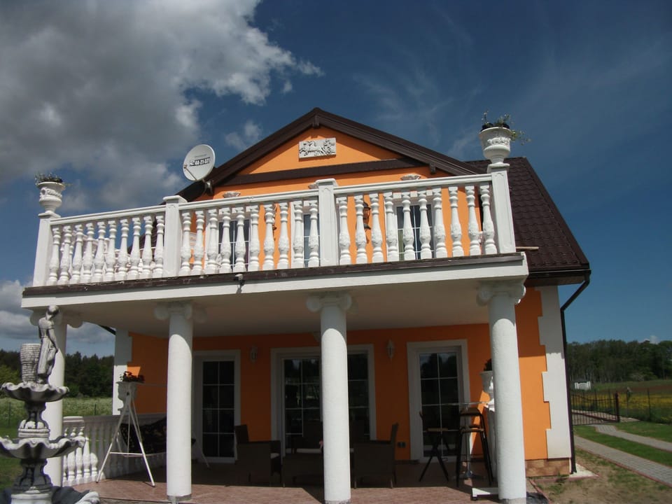 Freistehendes Ferienhaus Orange für 10 Personen Vacation rental in West Pomeranian Voivodeship, Poland
