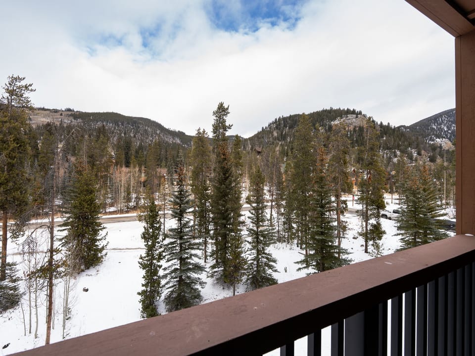 Step onto your private balcony and breathe in the crisp mountain air while taking in the stunning winter wonderland stretching before you.