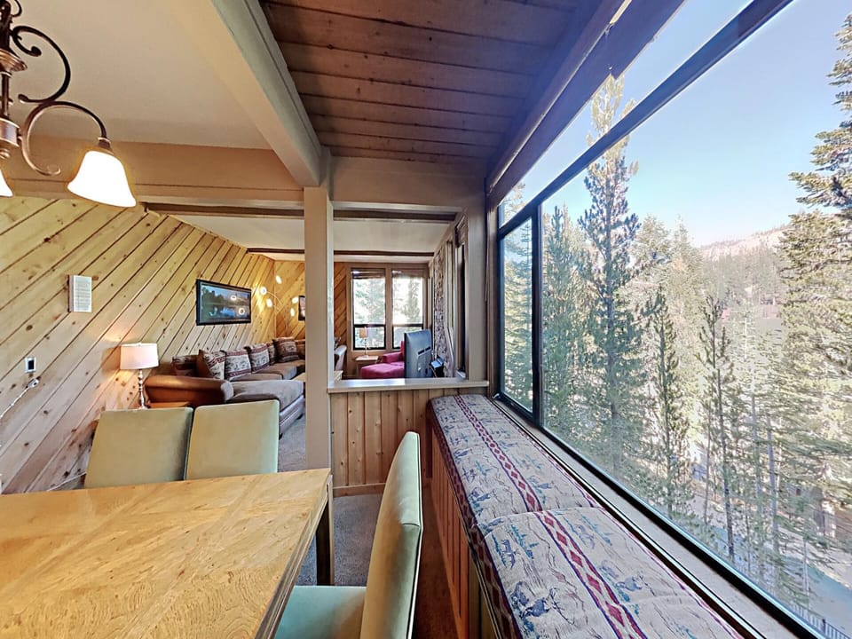 Window Seat with Firewood Storage and Forest Views