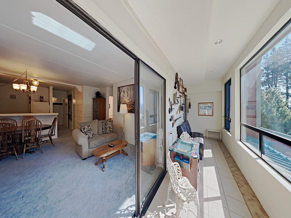 Sunroom with Arcade Machine