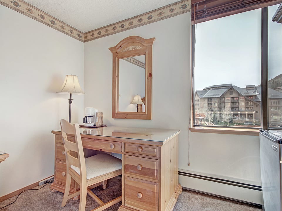 Desk vanity area looking out to West Lake and Center Village at Copper Mountain.