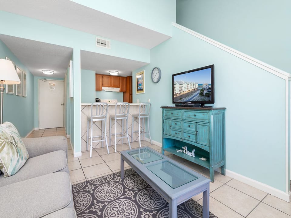 The spacious living area features a comfortable sofa sleeper for additional, overnight guests. A television is offered for entertainment in your down time.
