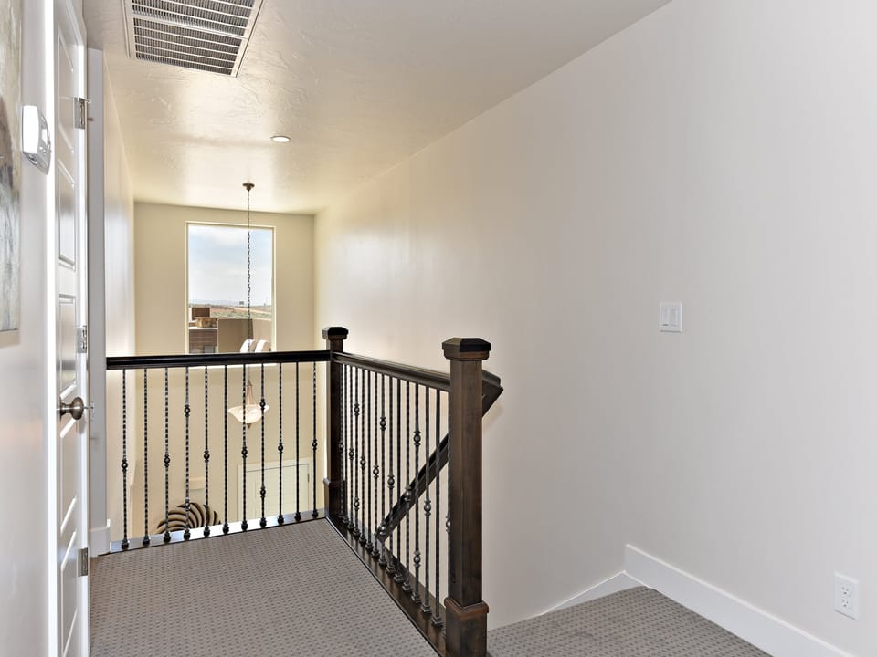 Upstairs landing view of front patio.