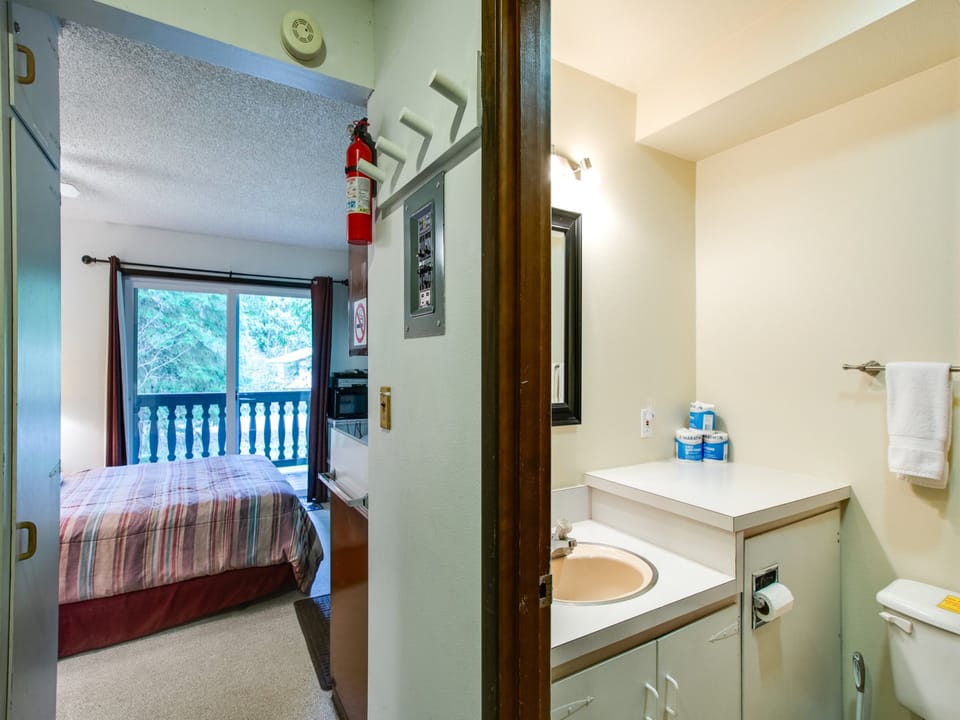 Studio entry and full bathroom