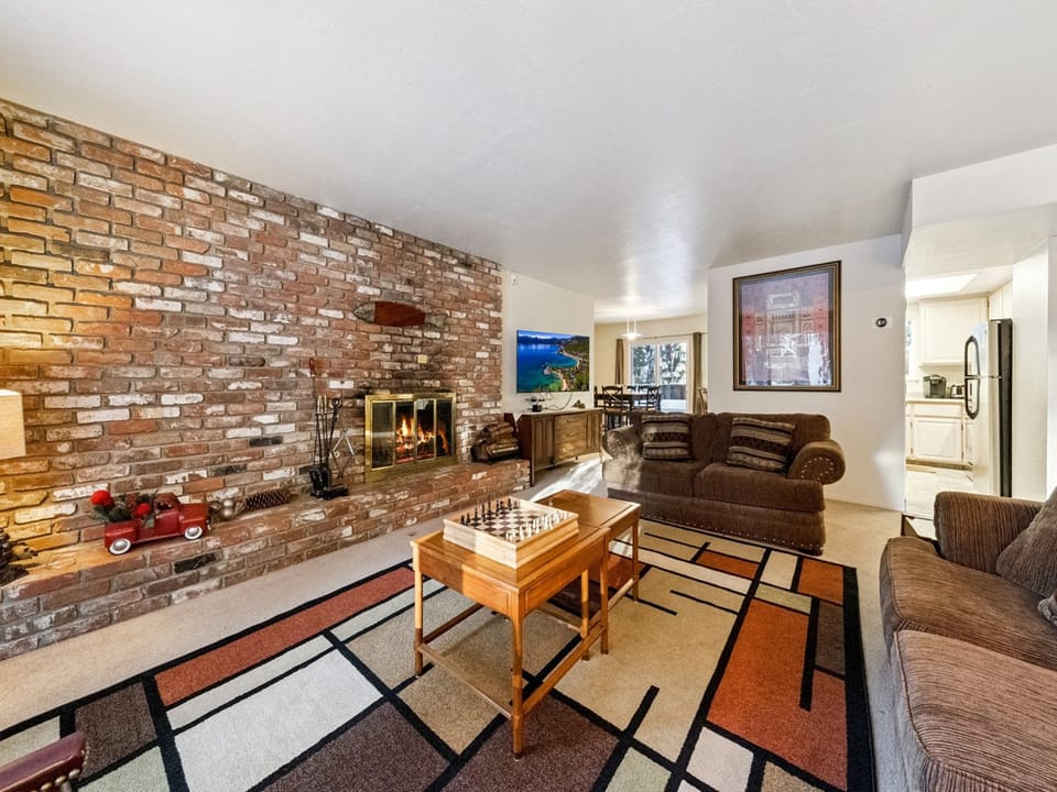 Living Room with Wood Burning Fireplace