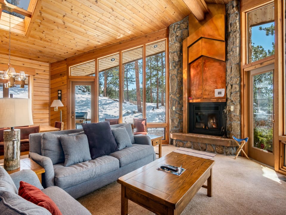 Stutzhaven - Open concept Great Room with a fireplace, couch and loveseat