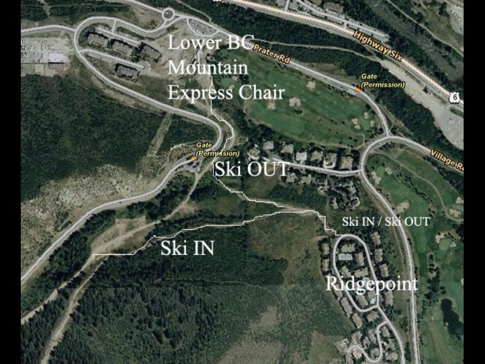 Aerial map showing ski trails and residential areas labeled 'Ski IN', 'Ski OUT', and 'Ridgepoint', with pathways to 'Lower BC Mountain Express Chair' and 'Highway 6'.