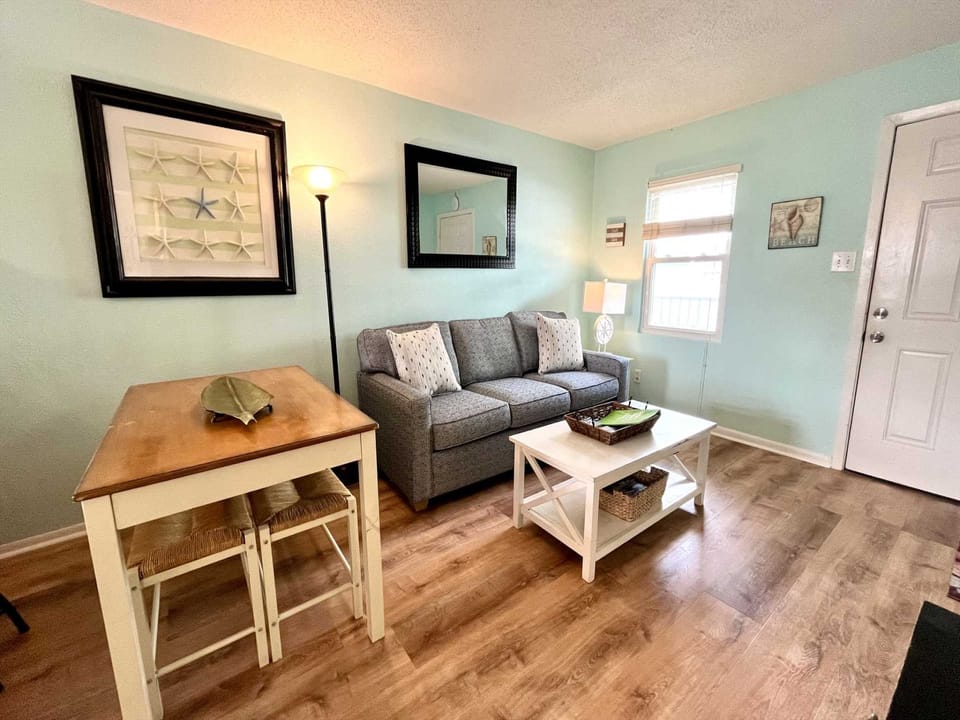 Living and dining area of Sunrise Village 104