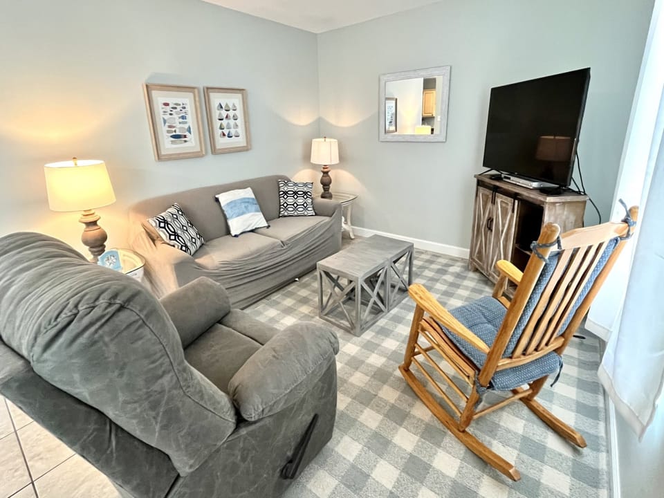 Unwind on the sleeper sofa in the living room and enjoy your favorite show on the 50" SMART Tv
