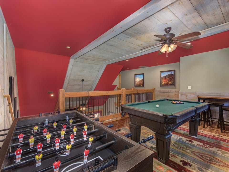 Loft game area, pool table and foosball.