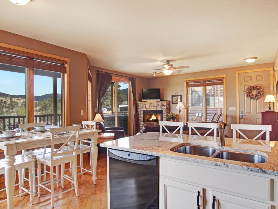 Sheep Mountain 20B - Open kitchen with seating for 4 at the dining table or the breakfast bar seats 3, all while enjoyed those amazing views