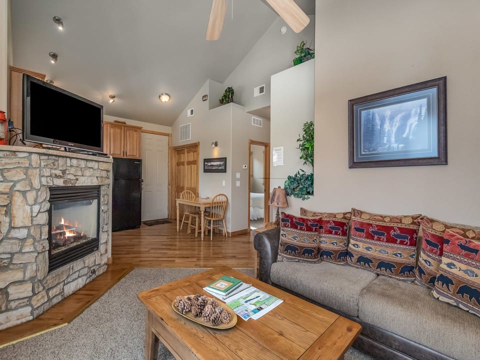 Teepee Mountain 12A  - Enter into your living area with queen sofa sleeper, gas fireplace, and flat screen TV.
