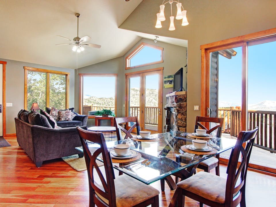 Mount Cairns 16A - Dining set for 4 overlooks the living room and beautiful views out the floor to ceiling windows.