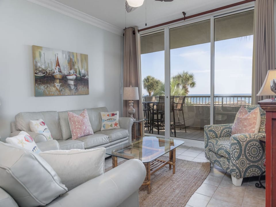 The spacious living area features plenty of comfortable seating, and is beautifully furnished to make you feel right at home.