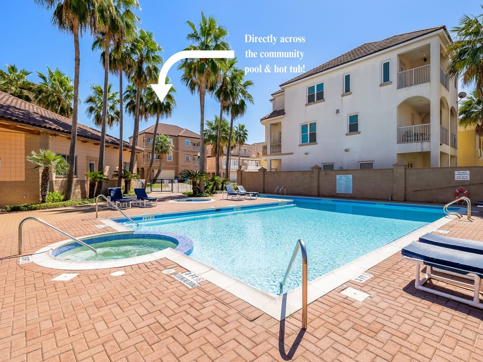 Large community pool with lounge chairs that get plenty of sun during the day! Our townhome is right across from the pool & hot tub area!