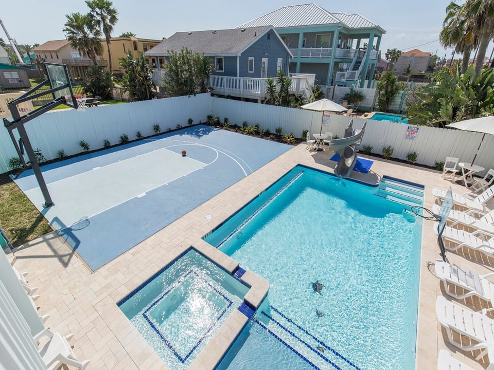 Resort style heated pool and basketball court!