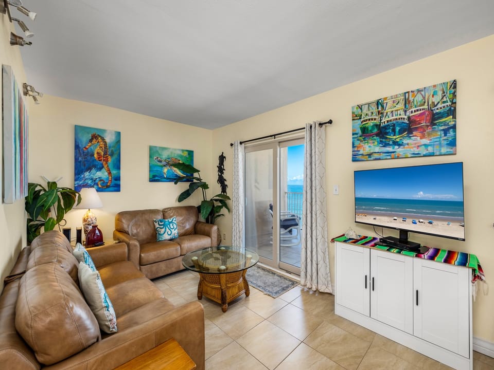 Double sliding doors off the living/ dining areas provide great views of the beach. You won't forget you're on island time now!