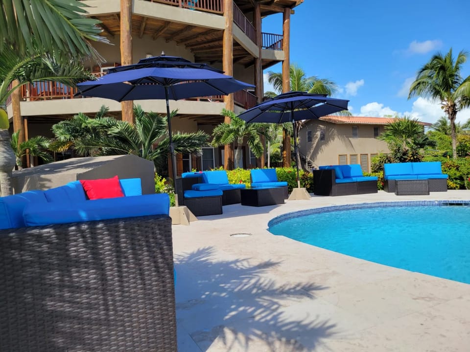 Pool deck with lounge chairs for Indigo guests