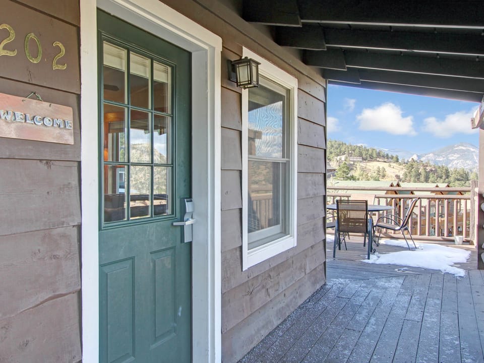 Ptarmigan Mountain 202 - Condo's front entrance from shared deck.